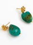 A pair of gold-tone dangle earrings featuring organic-shaped turquoise-green stone drops with natural matrix inclusions, displayed on a clean white background.