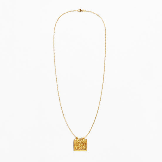 A delicate gold chain necklace featuring a small, textured square pendant, displayed against a clean white background.