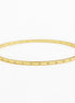 A thin gold bangle bracelet with small clear rhinestones set along the front edge, displayed on a clean white background.