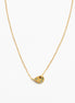 A delicate gold chain necklace featuring a small teardrop-shaped pendant adorned with tiny green and blue stones and a central black detail, set against a plain white background.